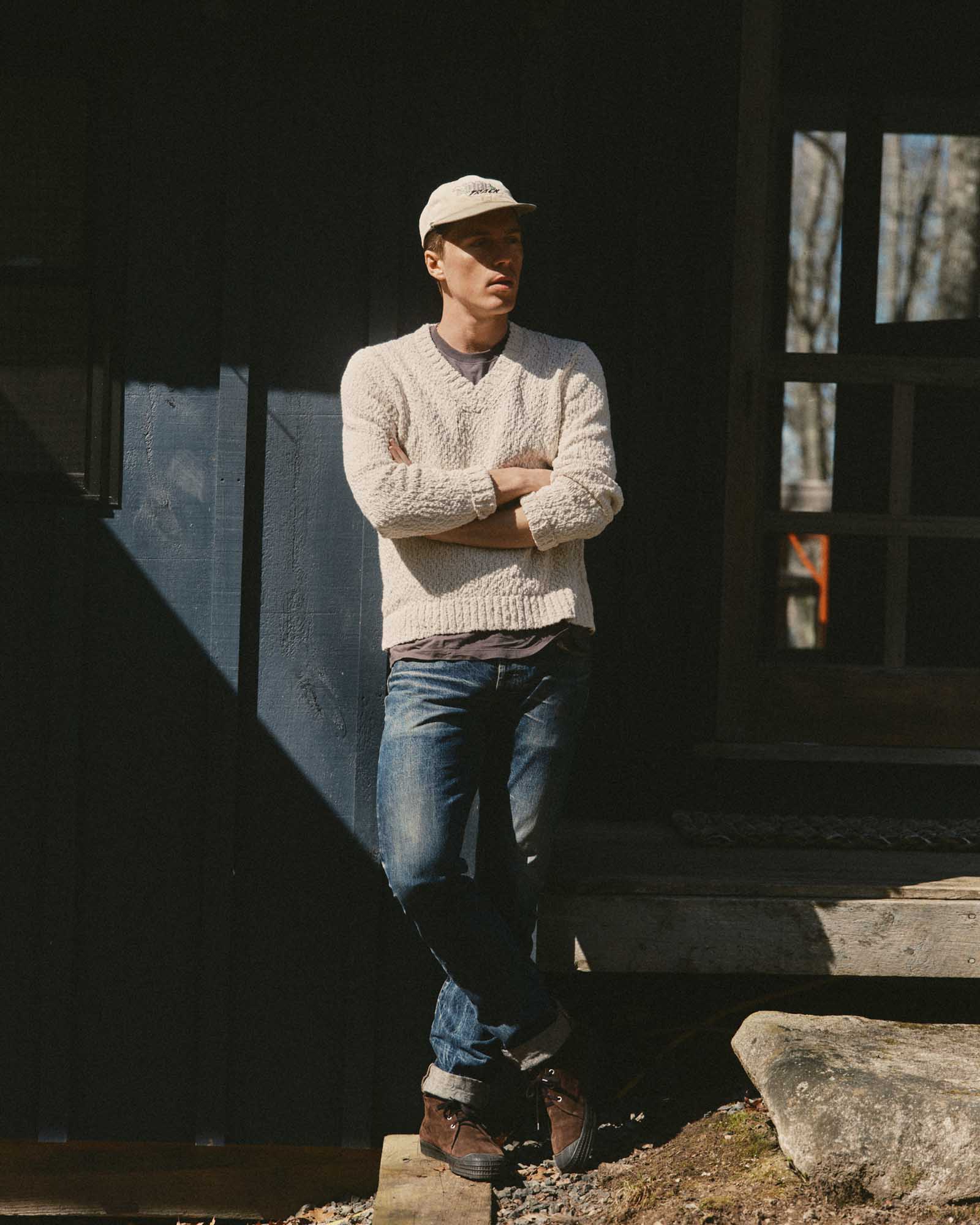 fit model showing off The Match V-Neck Sweater in Vintage White Slub, Knits by Taylor Stitch