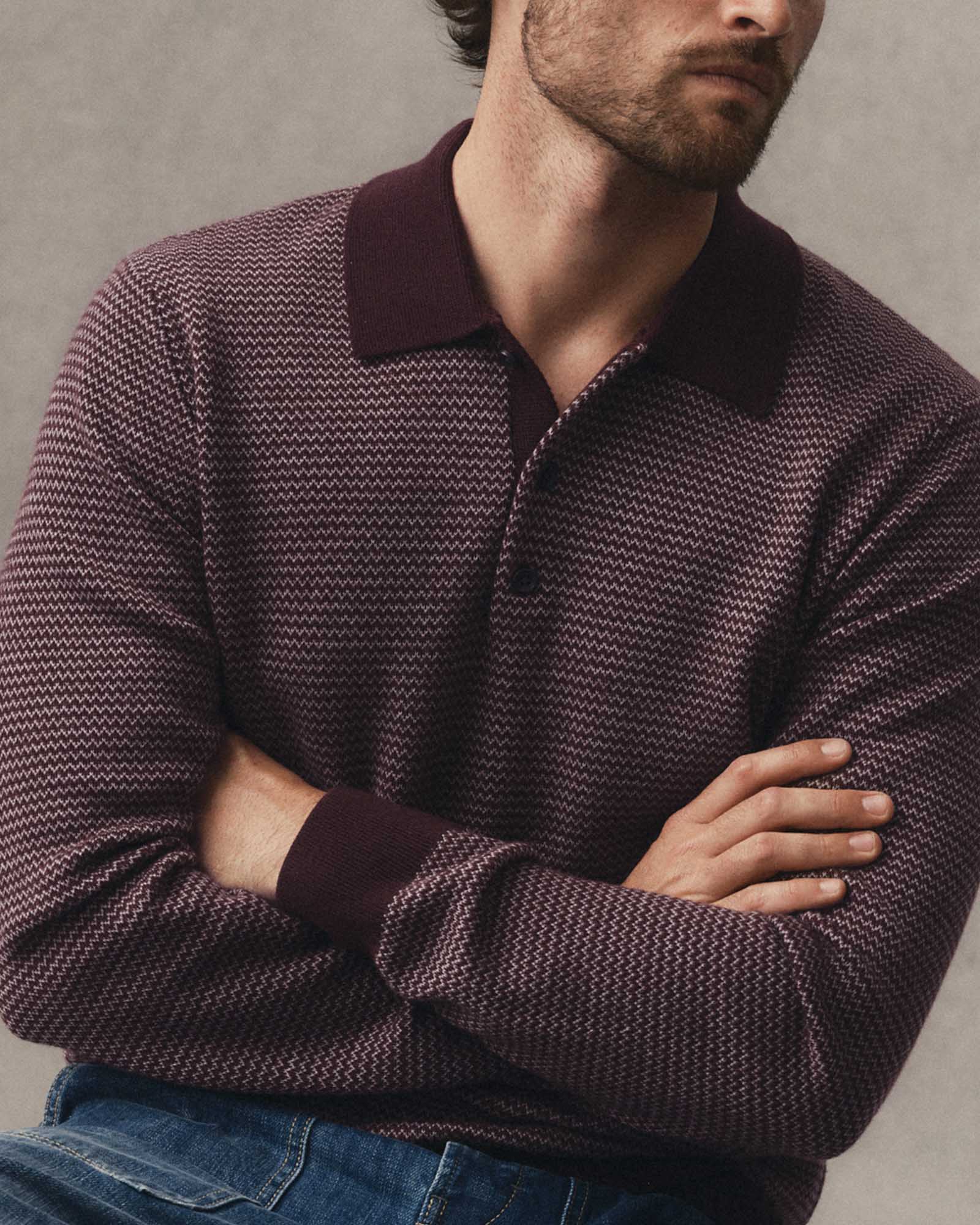fit model with his arms crossed wearing The Newton Sweater Polo in Burgundy Birdseye Merino, Knits by Taylor Stitch