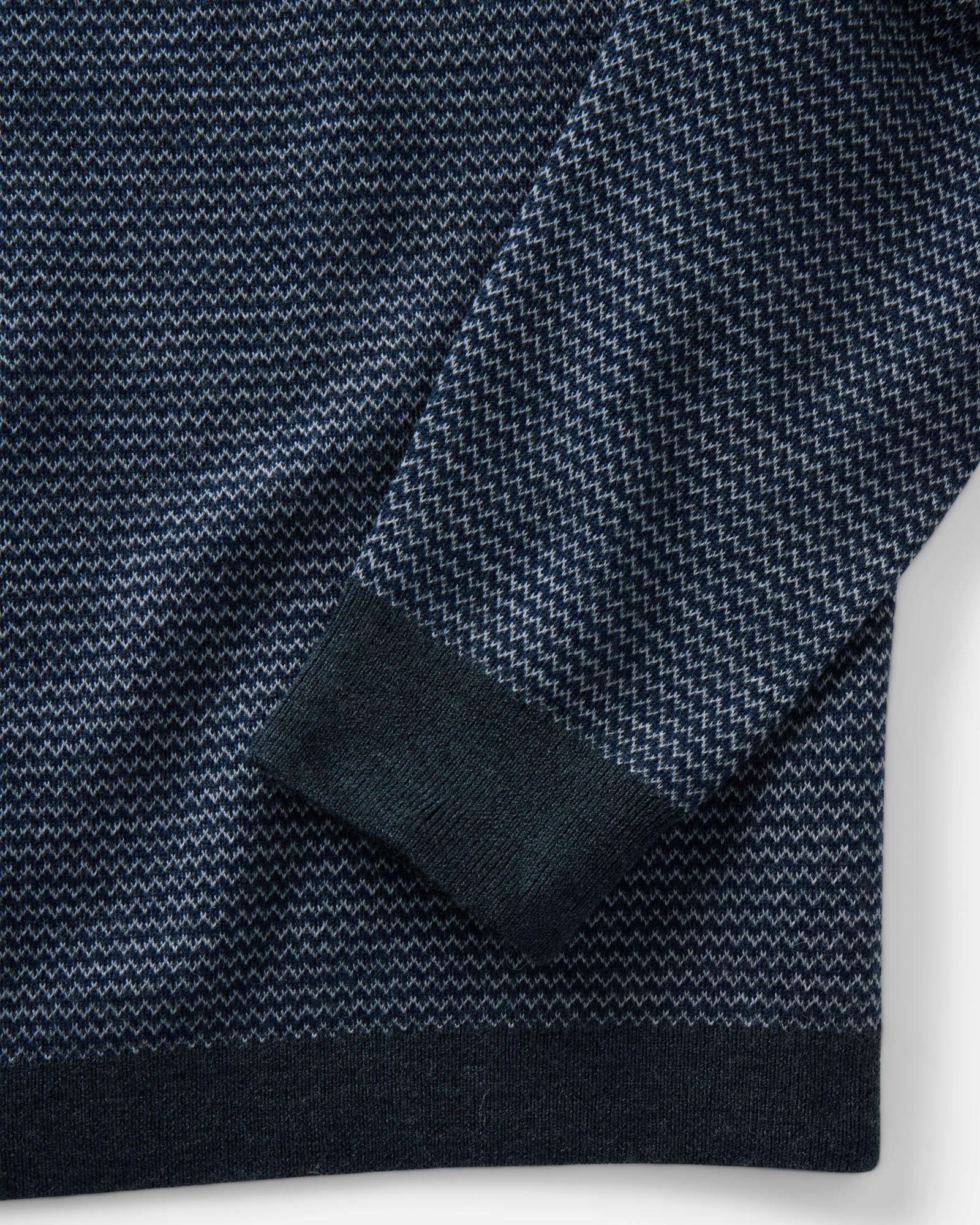 material shot of the sleeve on The Newton Sweater Polo in Navy Birdseye Merino, Knits by Taylor Stitch