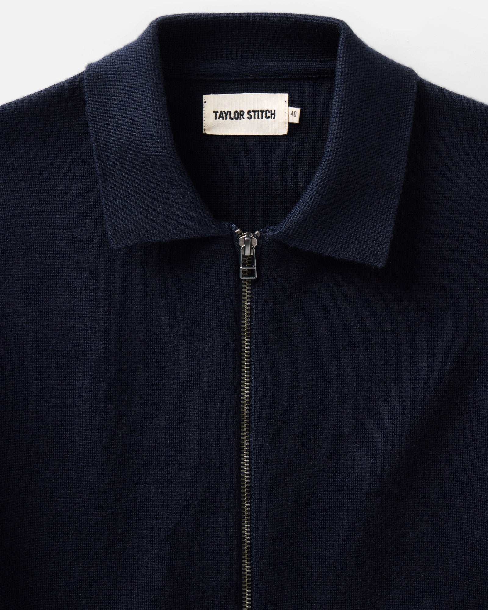 material shot of the collar on The Portola Sweater Jacket in Midnight Merino, Knits by Taylor Stitch