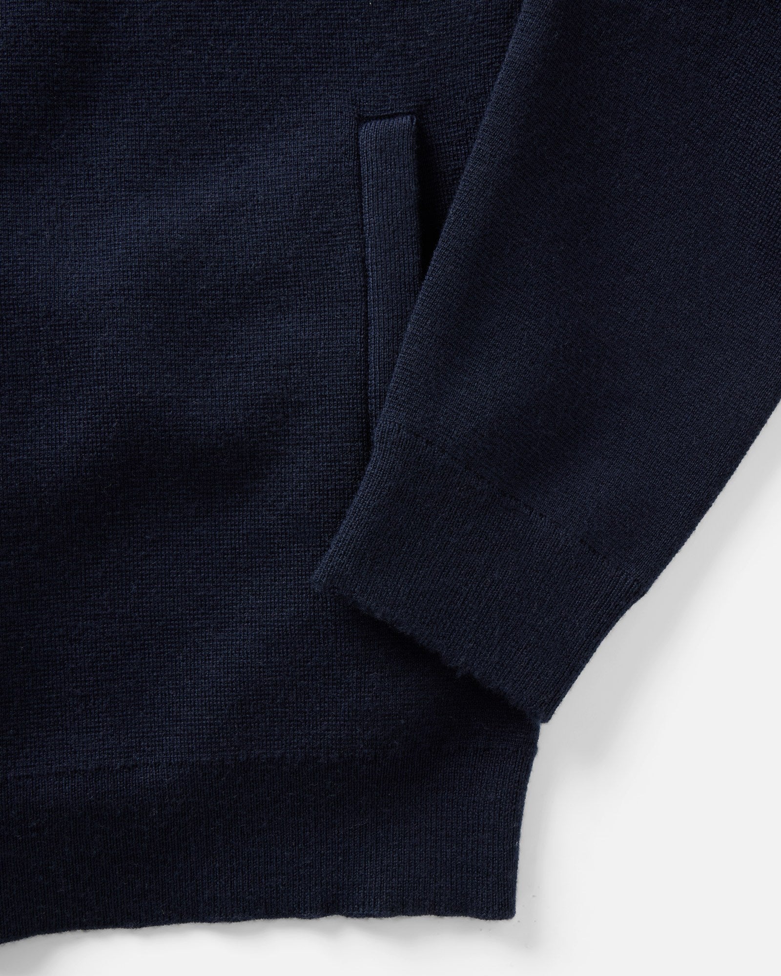 material shot of the pocket on The Portola Sweater Jacket in Midnight Merino, Knits by Taylor Stitch