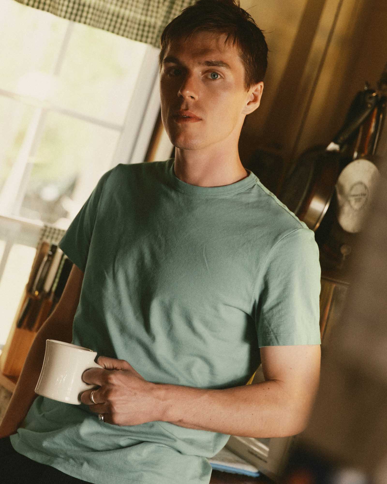 fit model showing off The Regenerative Cotton Tee in Faded Pine, Knits by Taylor Stitch