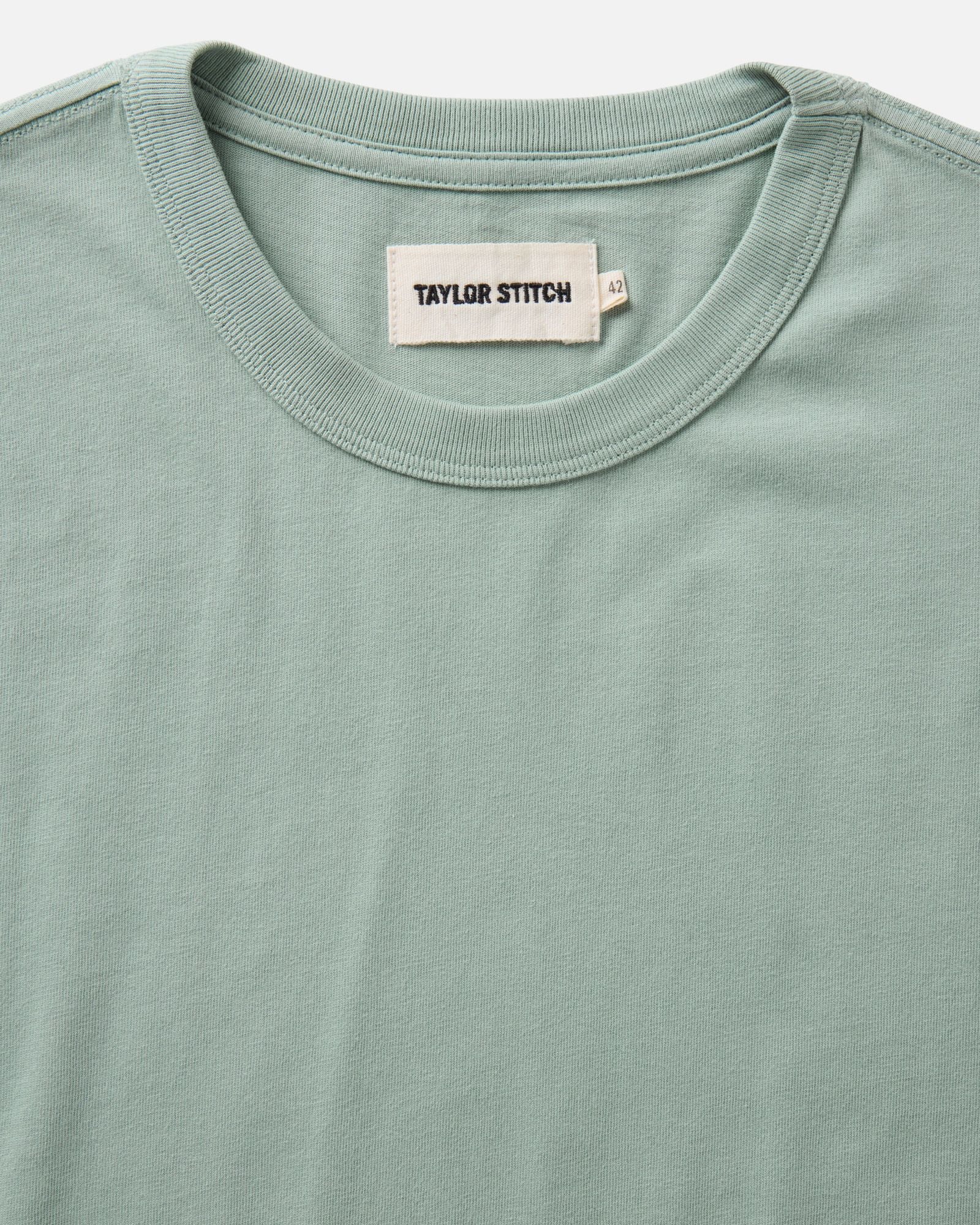 material shot of the collar on The Regenerative Cotton Tee in Faded Pine, Knits by Taylor Stitch