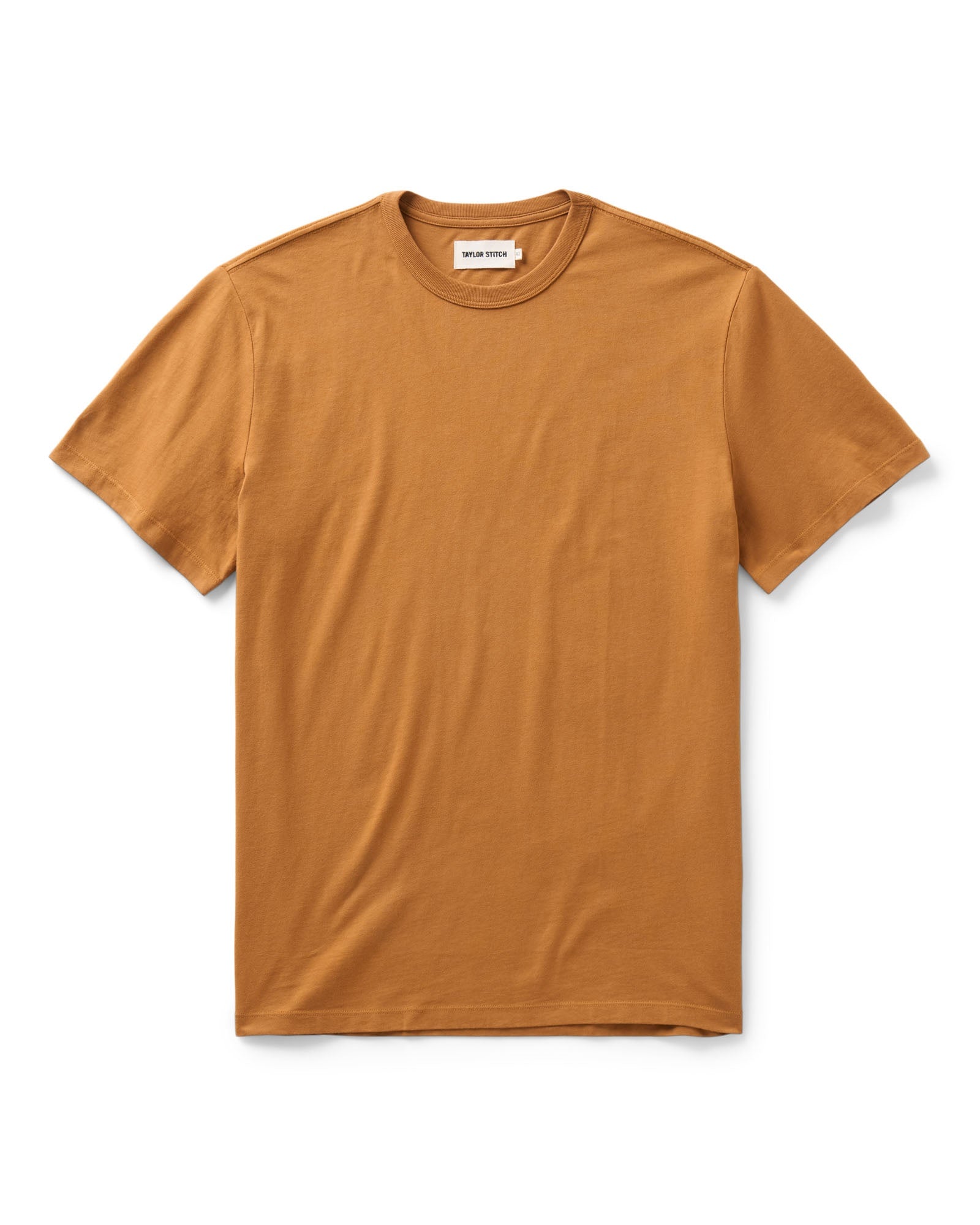 flatlay of The Regenerative Cotton Tee in Saffron, Knits by Taylor Stitch