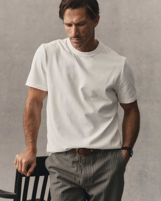 fit model posing in The Organic Cotton Shop Tee in White