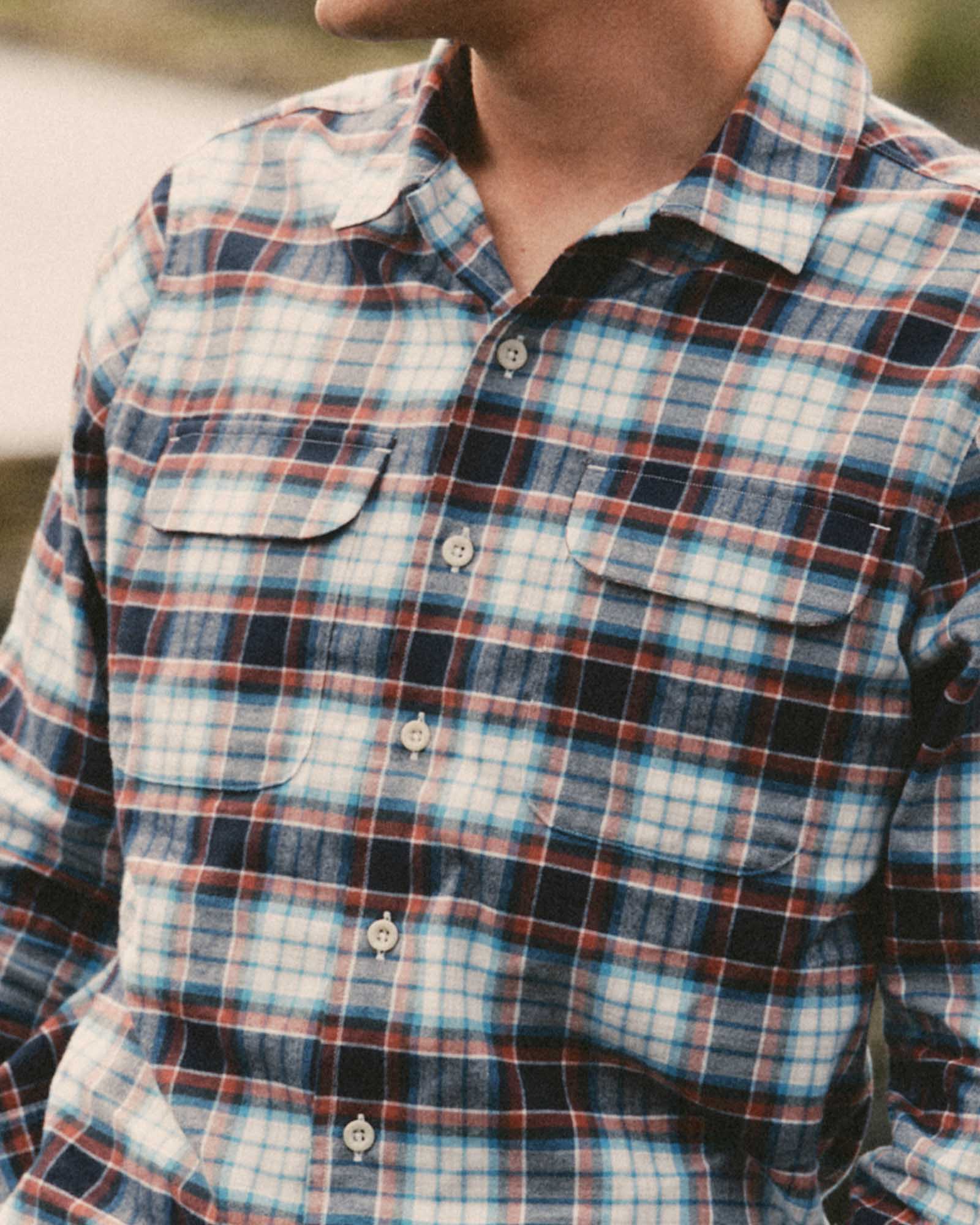 fit model posing in The Shore Shirt in Harbor Check Portuguese Flannel, Wovens by Taylor Stitch