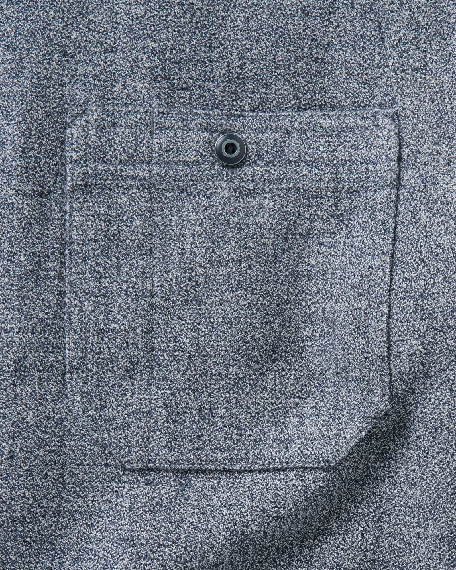 material shot of the pocket on The Tiller Half Zip in Greyscale Hemp Jaspe, Wovens by Taylor Stitch