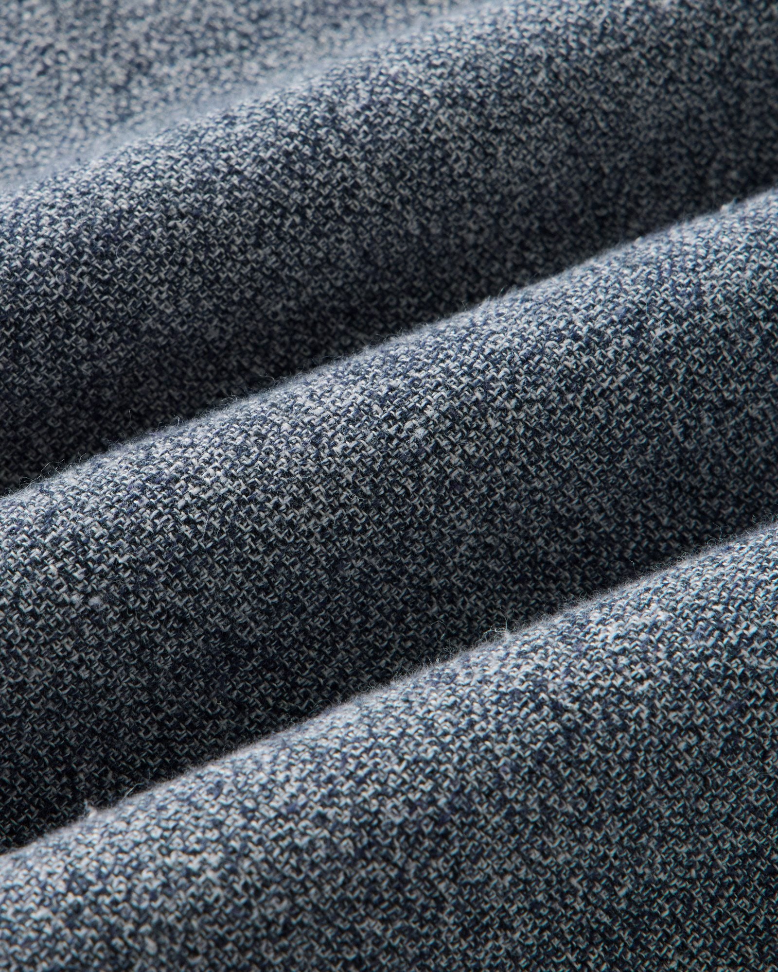 material shot of the sleeve on The Tiller Half Zip in Greyscale Hemp Jaspe, Wovens by Taylor Stitch