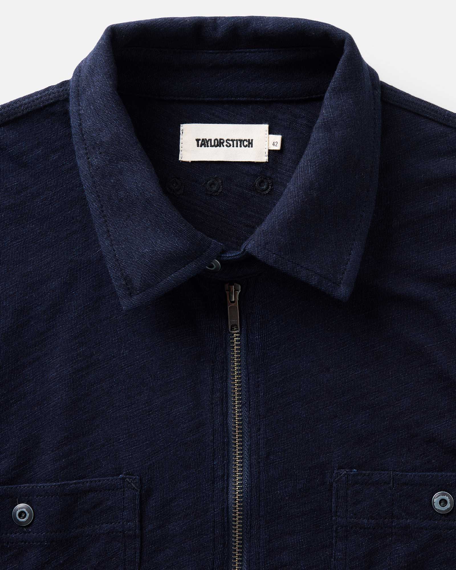 material shot of the collar on The Tiller Half Zip in Rinsed Indigo Slub, Knits by Taylor Stitch
