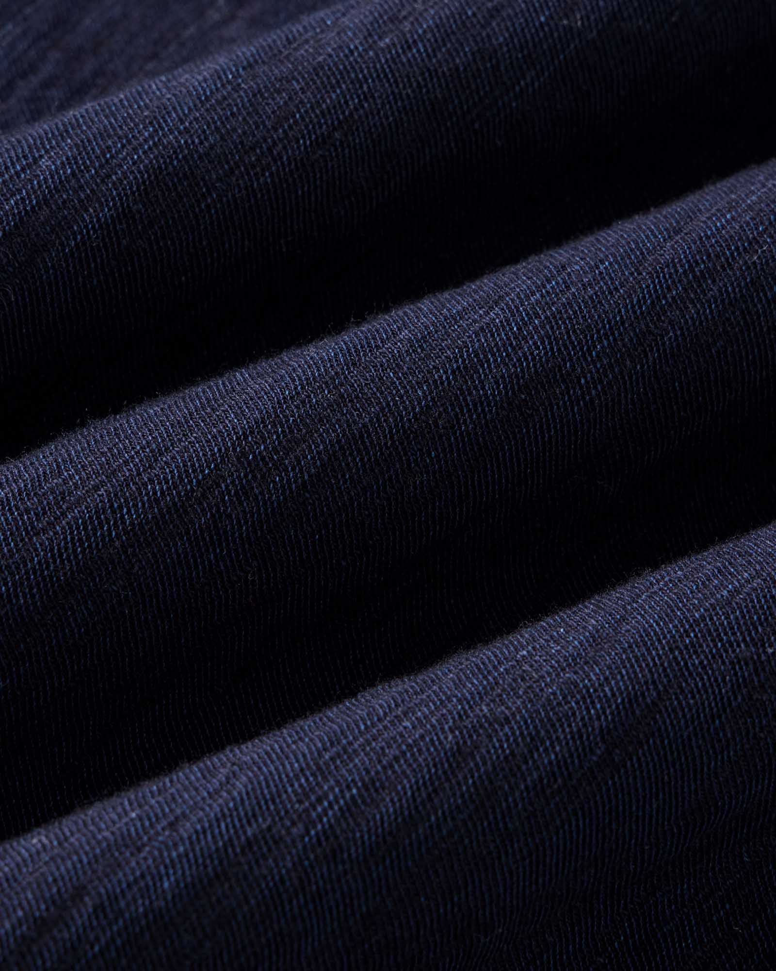 material shot of the fabric on The Tiller Half Zip in Rinsed Indigo Slub, Knits by Taylor Stitch