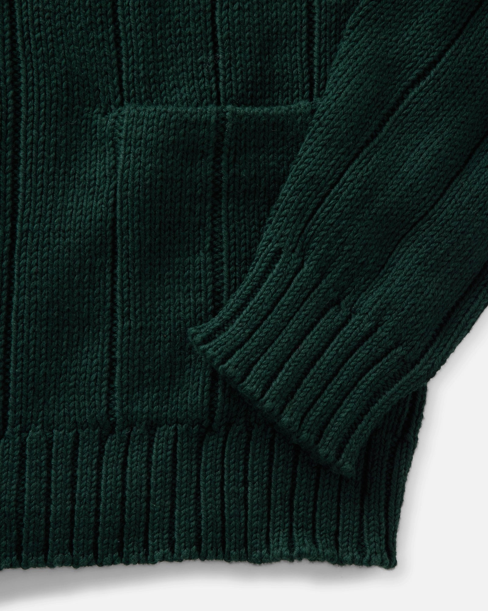 material shot of the sleeve on The Trench Cardigan in Dark Forest Rib Linen, Knits by Taylor Stitch