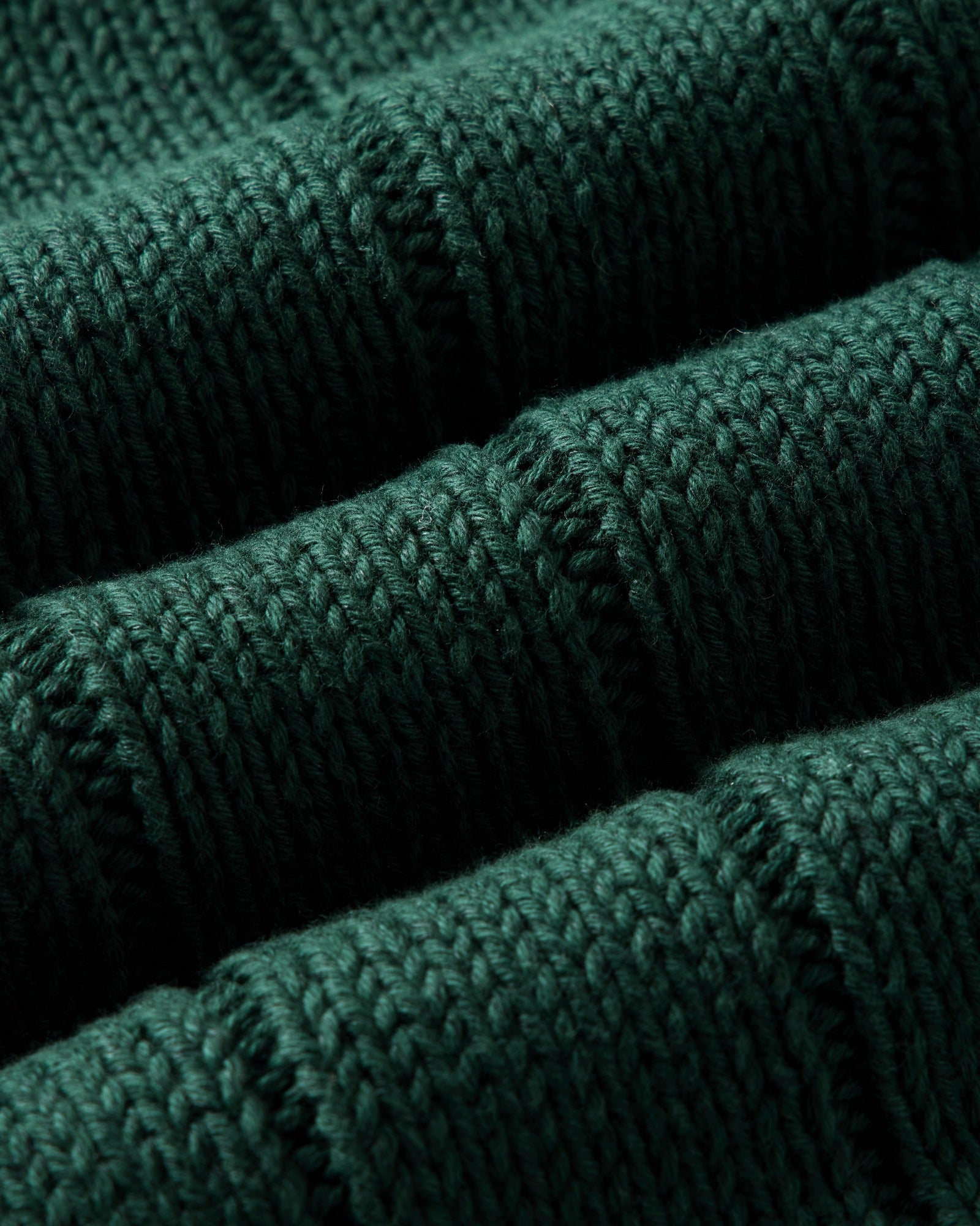material shot of the fabric on The Trench Cardigan in Dark Forest Rib Linen, Knits by Taylor Stitch