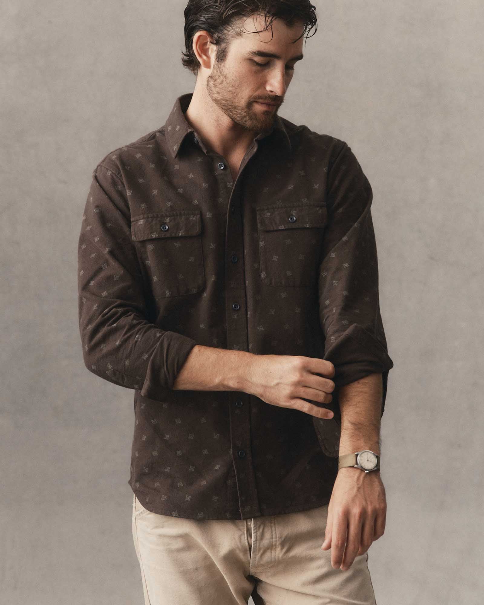 fit model adjusting the sleeve on The Yosemite Shirt in Carolina Geo, Wovens by Taylor Stitch