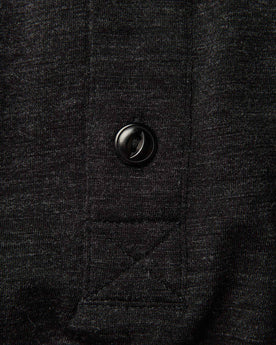 material shot of the buttons on The Merino Henley in Heather Black, Knits by Taylor Stitch