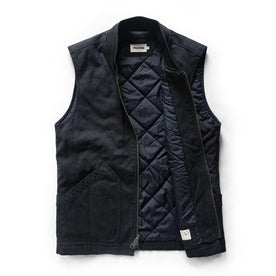 flatlay of The Workhorse Vest in Coal Boss Duck, open