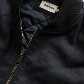 material shot of the collar on The Workhorse Vest in Coal Boss Duck
