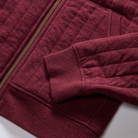 material shot of the ribbed cuffs and hem on The Apres Zip Hoodie in Burgundy Quilt