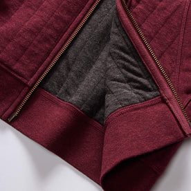material shot of the two-way YKK zipper on The Apres Zip Hoodie in Burgundy Quilt
