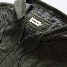 material shot of the hood on The Apres Zip Hoodie in Fatigue Olive Quilt