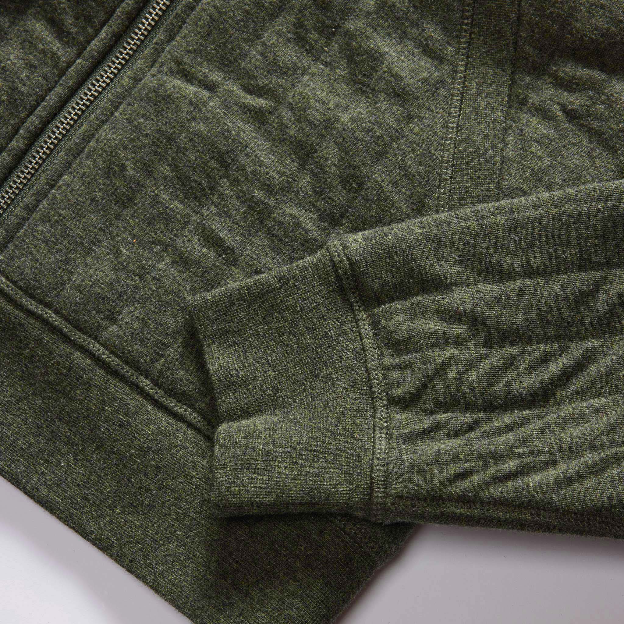 material shot of the ribbed cuffs and hem on The Apres Zip Hoodie in Fatigue Olive Quilt, Knits by Taylor Stitch