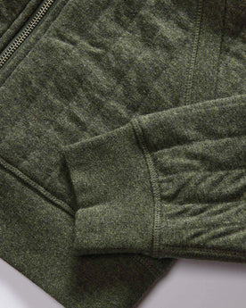 material shot of the ribbed cuffs and hem on The Apres Zip Hoodie in Fatigue Olive Quilt, Knits by Taylor Stitch