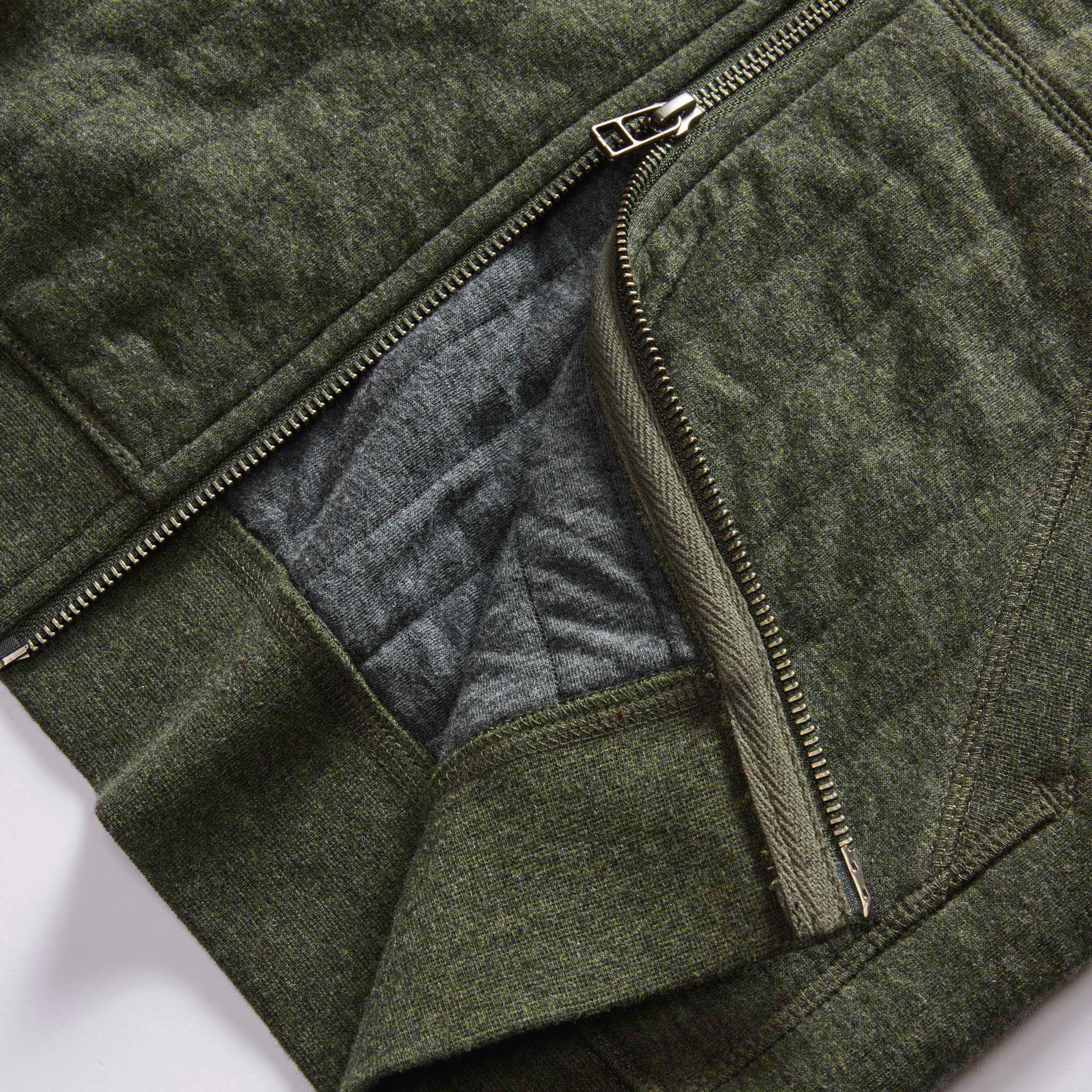 material shot of the two-way YKK zipper on The Apres Zip Hoodie in Fatigue Olive Quilt, Knits by Taylor Stitch