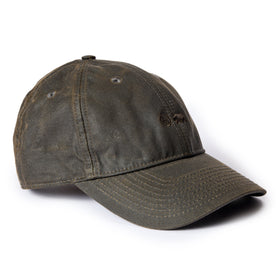 flatlay of The Ball Cap in Soil Waxed Canvas, from an angle