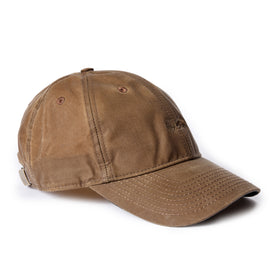 flatlay of The Ball Cap in Dark Khaki Waxed Canvas, from the side