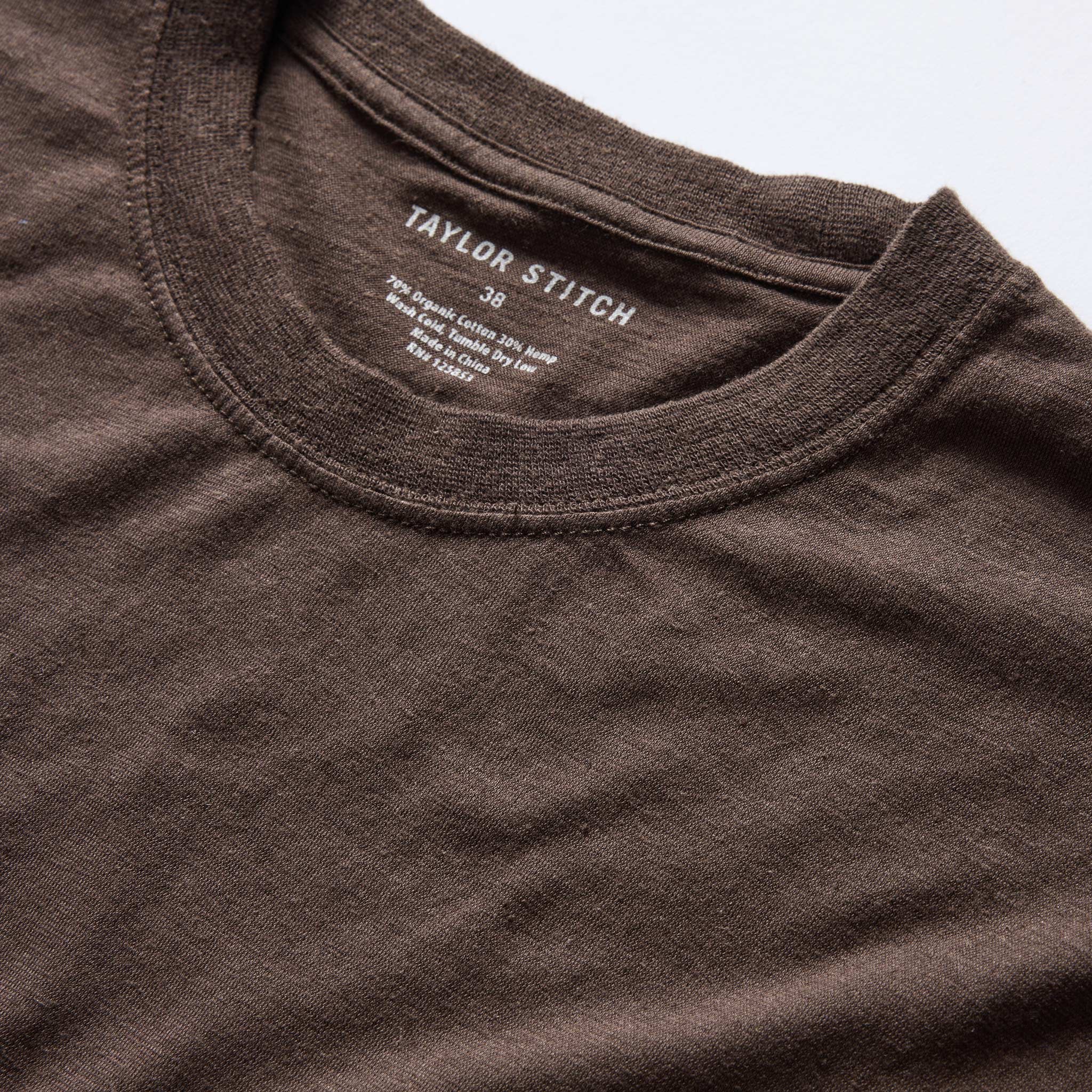 material shot of the neck opening on The Cotton Hemp Tee in Soil, Knits by Taylor Stitch