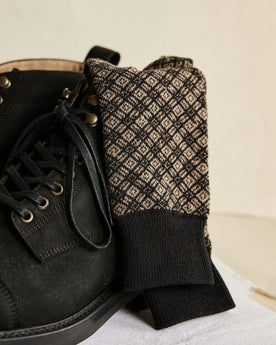 The Crew Sock in Coal Jacquard on a boot, Accessories by Taylor Stitch