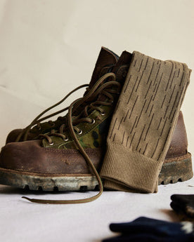 The Crew Sock in Rain Drop Camo on a boot, Accessories by Taylor Stitch