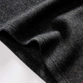 material shot of the hem on The Evans Crew in Charcoal Birdseye Wool