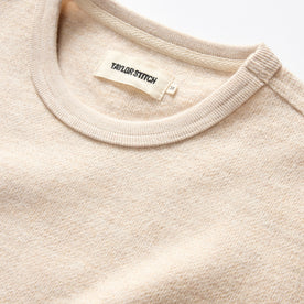 material shot of the ribbed neck opening on The Evans Crew in Oat Birdseye Wool