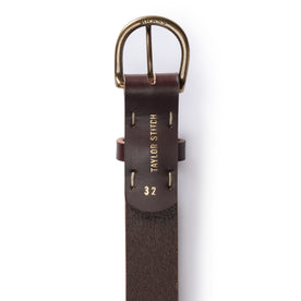 material shot of the Taylor Stitch logo on The Foundation Belt in Dark Brown