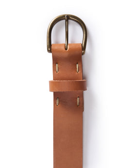 editorial flatlay of the buckle on The Foundation Belt in Whiskey, Accessories by Taylor Stitch