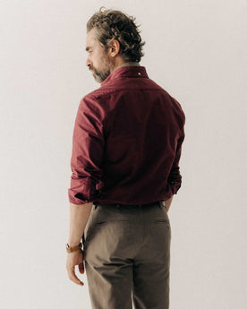 fit model posing in The Jack in Burgundy Oxford, Wovens by Taylor Stitch
