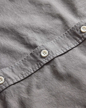 material shot of the butons on The Jack in Smoke Oxford, Wovens by Taylor Stitch