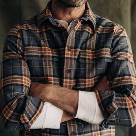 fit model crossing his arms in The Ledge Shirt in Conifer Plaid