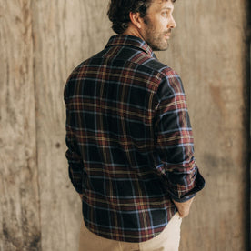 fit model showing the back of The Ledge Shirt in Dark Navy Plaid