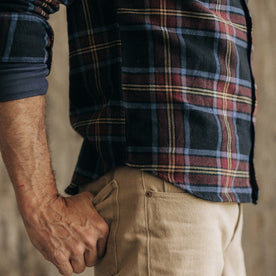 fit model showing the side of The Ledge Shirt in Dark Navy Plaid