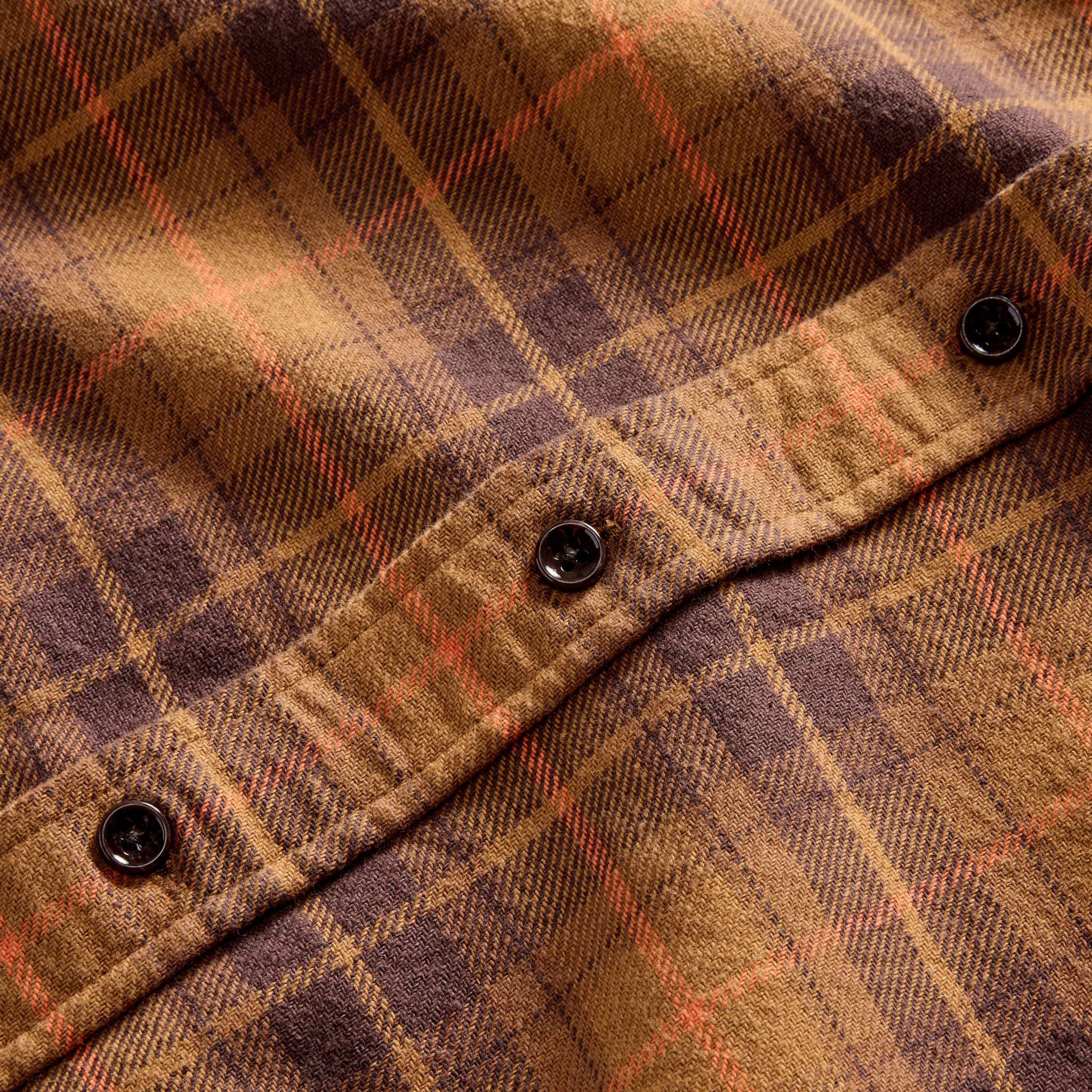 material shot of the buttons on The Ledge Shirt in Tarnished Brass Plaid, Wovens by Taylor Stitch