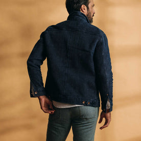 fit model showing off the back of The Long Haul Jacket in Indigo Waffle