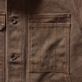 material shot of the chest pocket on The Longshore Jacket in Aged Penny Chipped Canvas