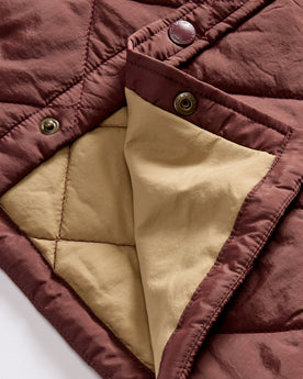 material shot of the snap buttons on The Miller Shirt Jacket in Burgundy, Outerwear by Taylor Stitch