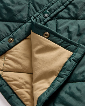 material shot of the snap buttons and quilted lining on The Miller Shirt Jacket in Conifer, Outerwear by Taylor Stitch