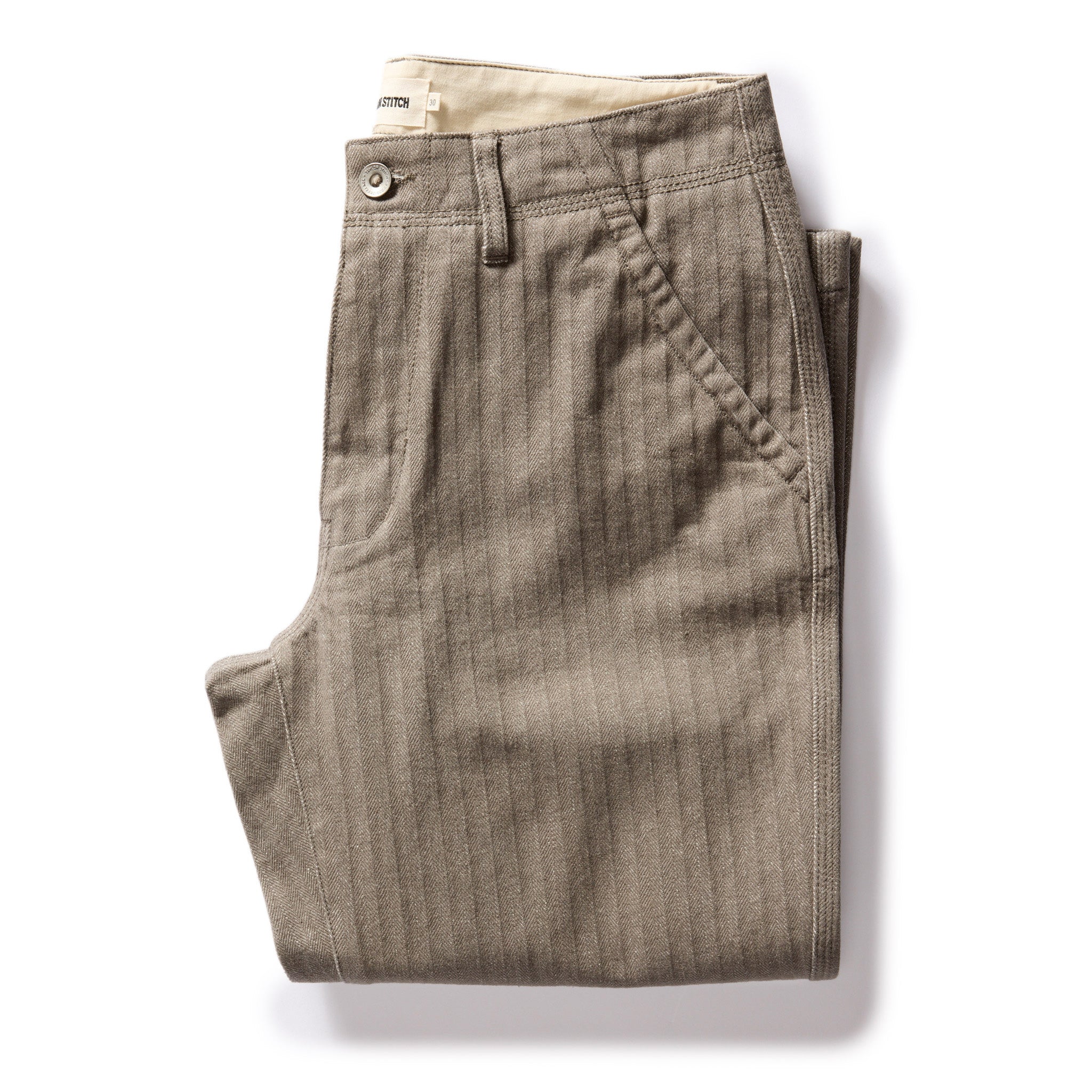 flatlay of The Morse Pant in Smoked Olive Herringbone Twill, Bottoms by Taylor Stitch