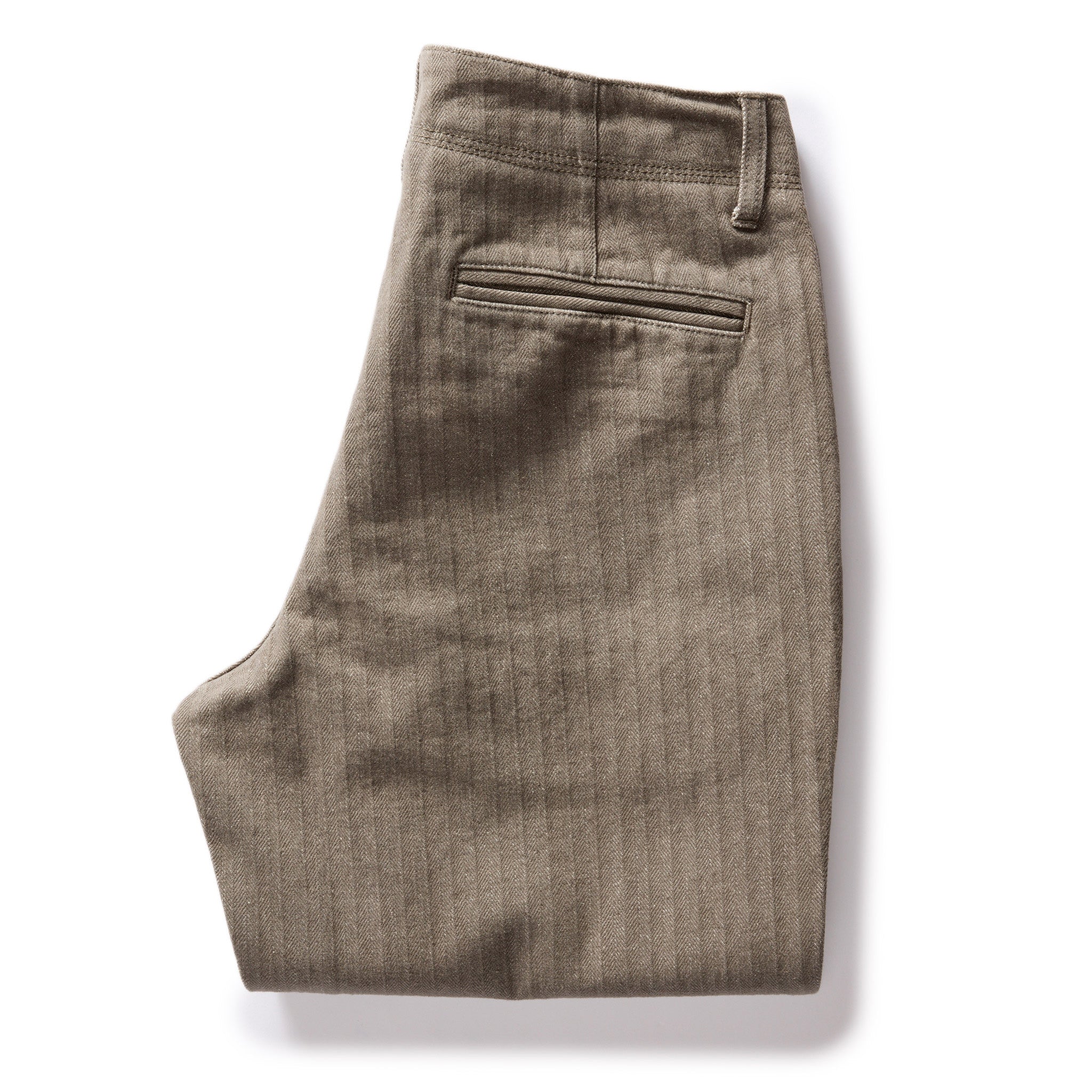 flatlay of The Morse Pant in Smoked Olive Herringbone Twill, folded from the back, Bottoms by Taylor Stitch