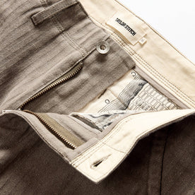 material shot of the zipper fly on The Morse Pant in Smoked Olive Herringbone Twill