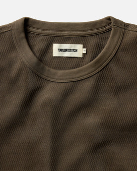 fit model walking on a beach in The Organic Cotton Waffle Crew in Fatigue Olive, Knits by Taylor Stitch