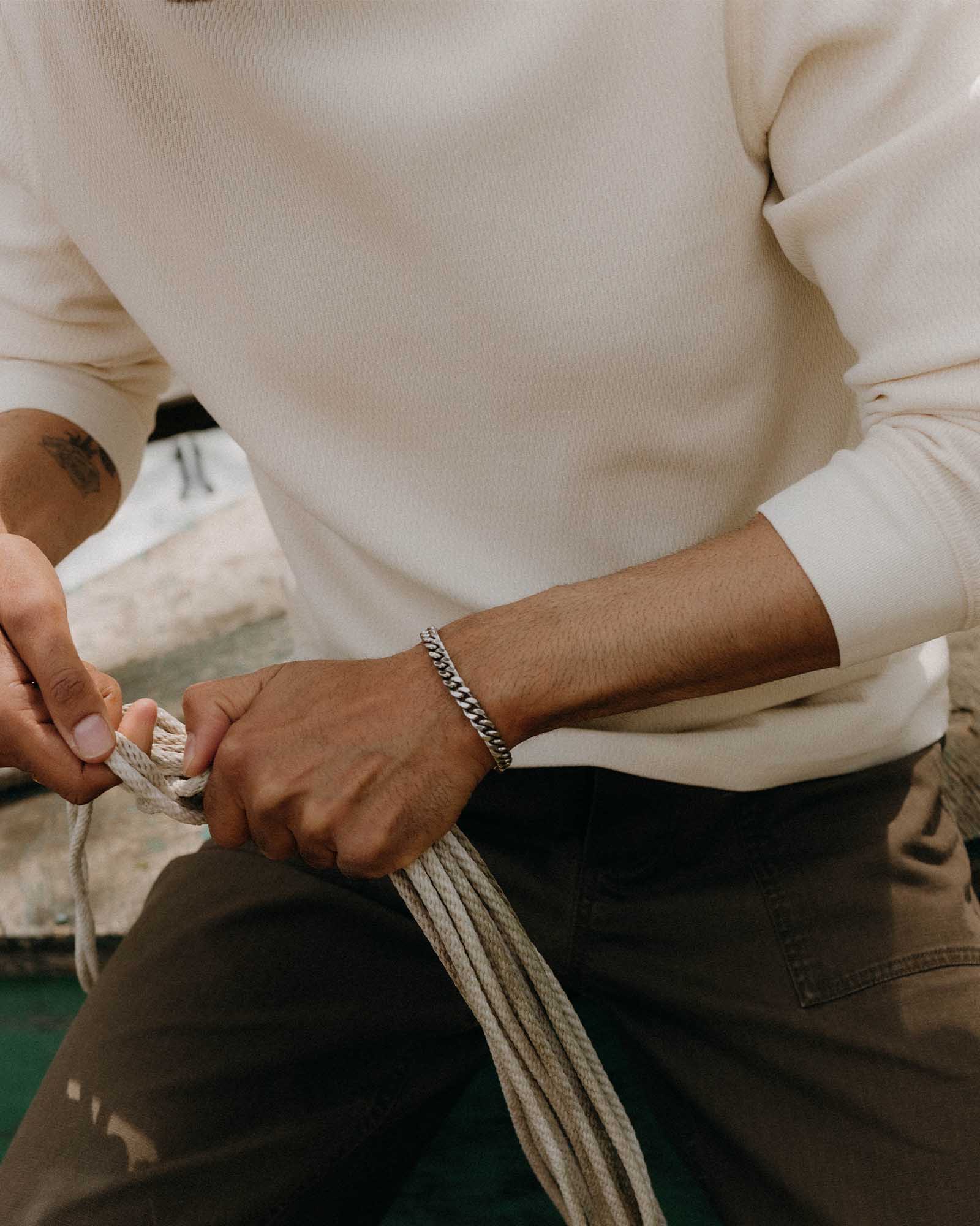 fit model showing the waffle texture on The Organic Cotton Waffle Crew in Natural, Knits by Taylor Stitch